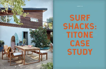 Surf shack pictured on the left hand page, orange words with a light blue background on the opposite page.