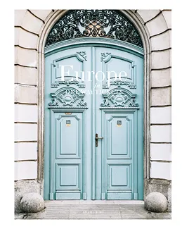 Photo of a grand, ornate double blue door with decorative arch.