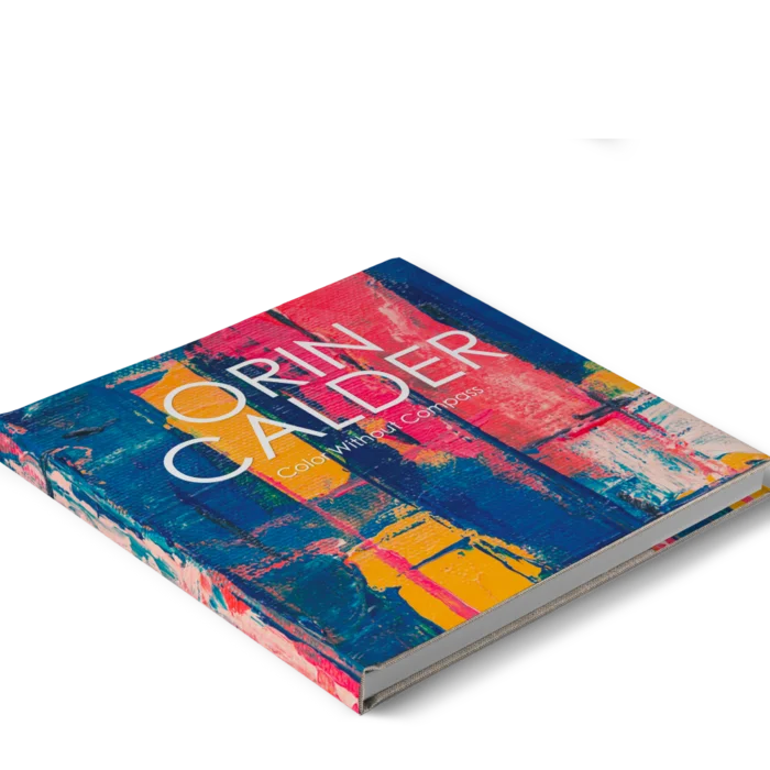 A square hardcover photo book titled Orin Calder Color without Compass with a colorful paint effect design on the cover 