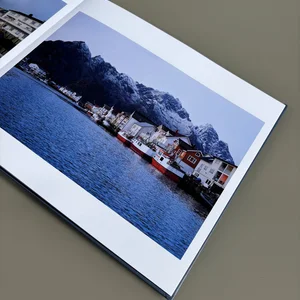 Axel Belot’s Layflat photo book, New Perspective on Landscape: Norway, open on a photo of a fjord and mountains