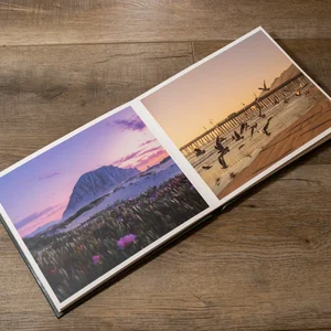 Nathan Campbell's Layflat photo book, California, open on two landscape photos taken along the coast of California