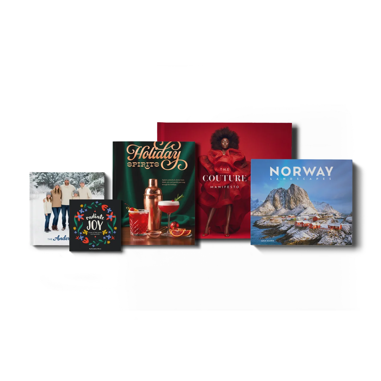 Five different sized custom books with covers showing family photos, fashion, cocktails, landscapes, and fun illustrations