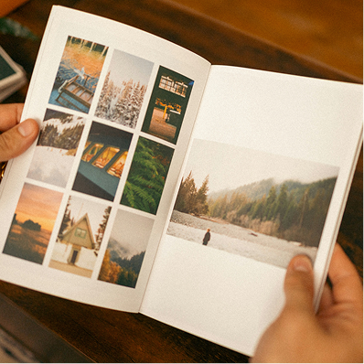 Let’s Make a Book (3/27/4) - Hands flipping through a beautifully designed photo book filled with travel images.