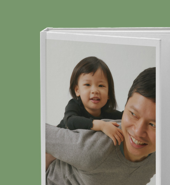 Family photo book made using Blurb's tools showing two family members on the cover